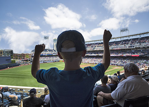Boy watching live baseball game