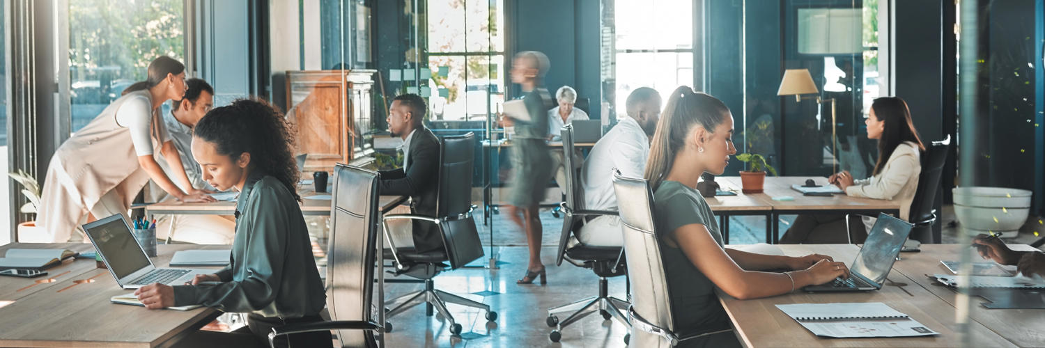 a group of people in an office