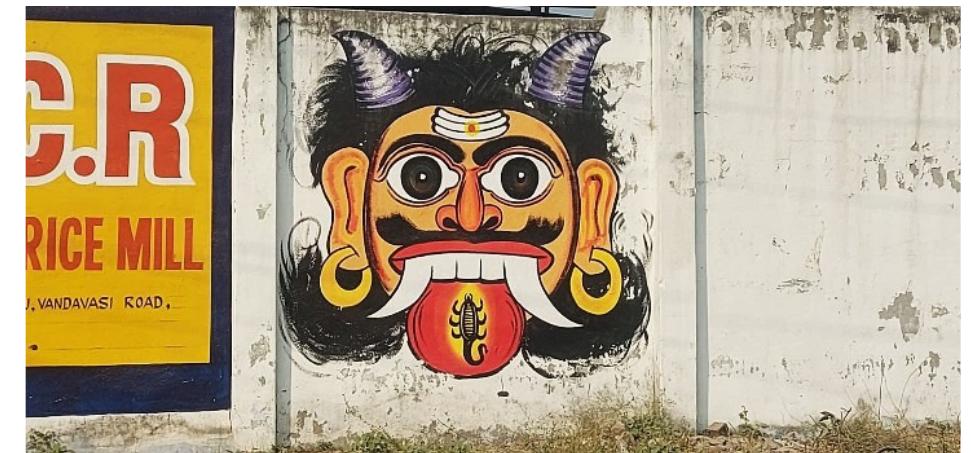 Fig. 7 Drishti Bommai on compound wall 
