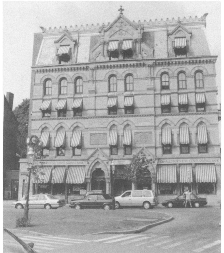 Fig. 3.1. Charlestown, Massachusetts, Masonic Hall, 1876. (Photograph by William D. Moore.)  While much could be written about the way in which Masonry was expressed on the exterior of these structures, this essay will concentrate on the lodge rooms within the buildings, for these spaces were of central importance to the Masonic charac- ter of the buildings.'' In 1886, at the dedication of the Masonic temple in Waterbury, Connecticut, J. W. Richards called the lodge room “a soul within a tabernacle of clay.” He said that it was here that “Masonic thought and activity are born; here that life courses which gives meaning to all the exter- nals.”'? The lodge room was where Masonic ritu- als were enacted. It was where the abstract idea of a fraternity of men took concrete form, and where a lodge defined itself. 