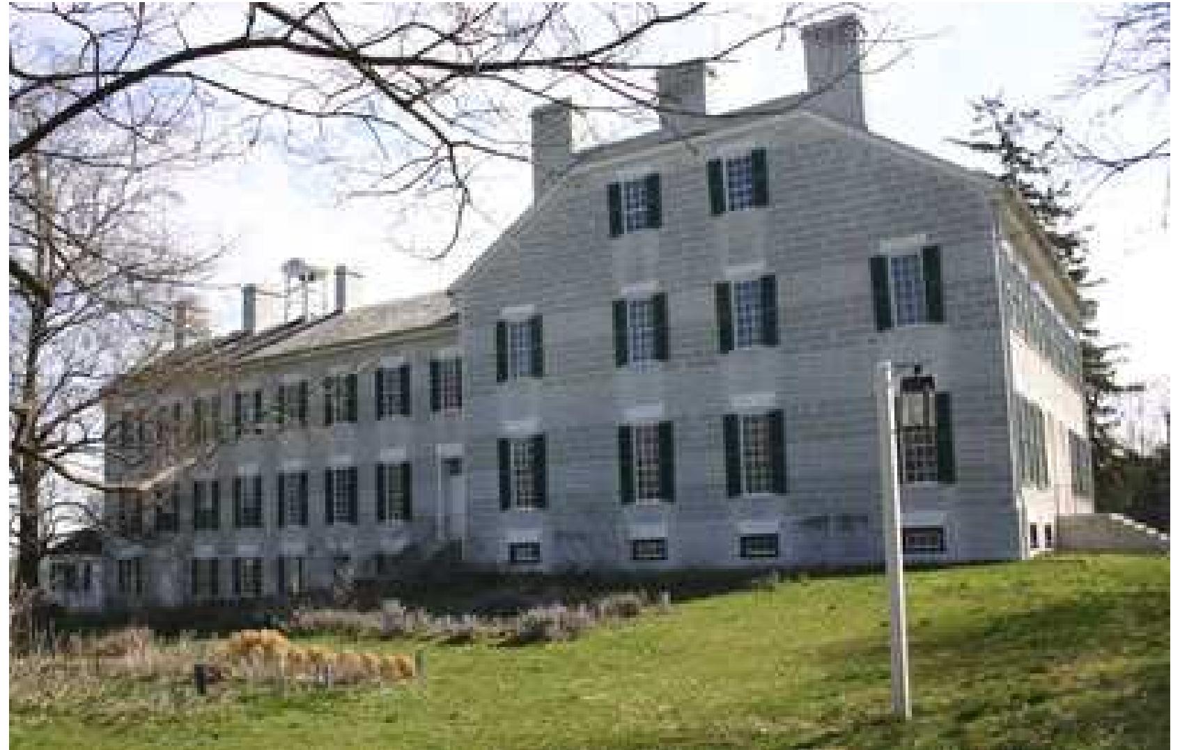 Figure 6. Dwelling House. Historic American Buildings Survey, Library of Congress.  eiienenieieinal ji  Entry to the building was governed by one’s gender; Shaker brothers used the left door and the sisters used the right door (Figure 6). Inside, the pattern continued; men used the left staircases and women used the right ones. The dormitory rooms on the upper floors were assigned so that men lived on the left side of the hall and women were given rooms on the right side. 