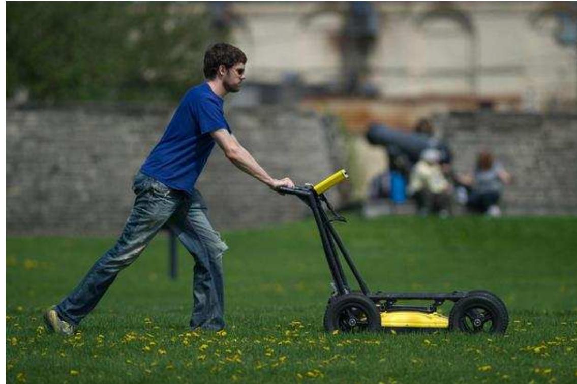 Plate 1: Blake Williams Conducting a GPR Survey at Fort Y ork. 