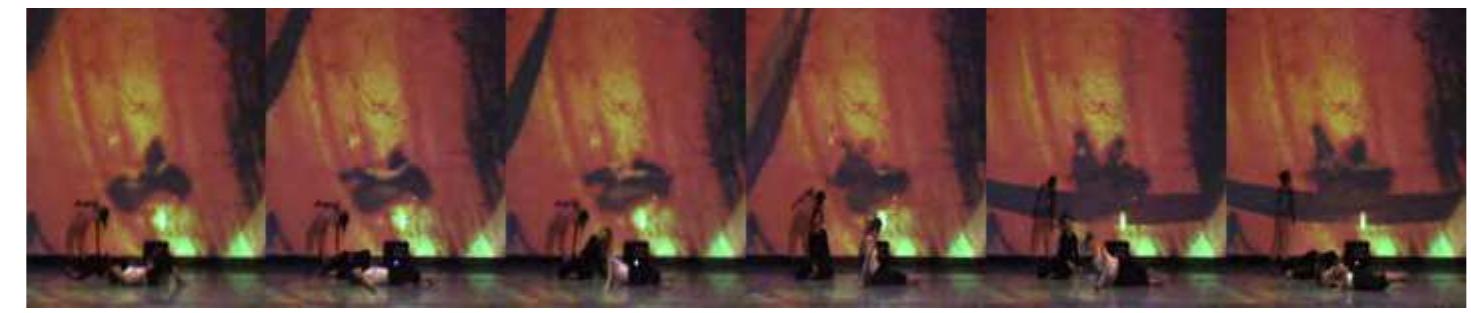 Figure 8: Ouija Experiments: Dancers under projection of live brushwork by Filip Radonjik, composited with processed video of their own movement. 