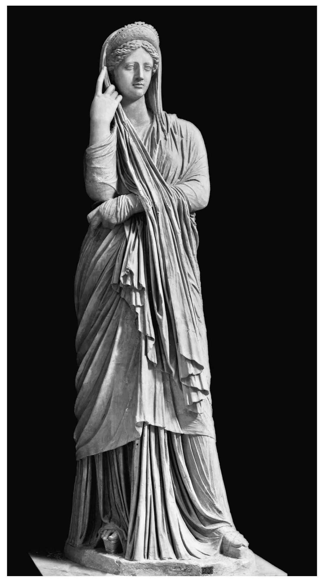 chin, as seen in mirror image on the Pudicitia type illustrated in Figure 8. Studies of this type tend to put its invention in the 2nd century B.c., though since all the supposedly early versions are undated, this is little more than guesswork. 