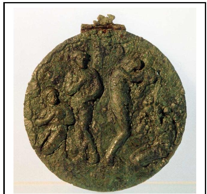Fig. 9 Bronze case-mirror from Herakleia. Elis Museum. 
