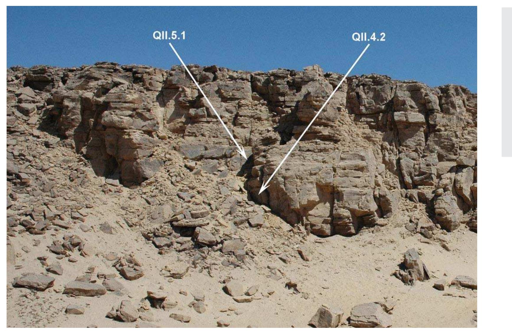 Figure 3. View of Qurta II with location of panels QU.4.2 and QUI.5.1 partly covered by Nubian sandstone rock debris anc sediment accumulations.