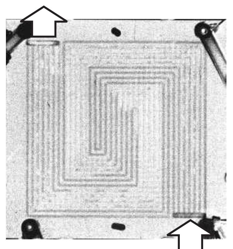 The performance of the two neutron detector systems was evaluated with the fuel cell housing of type I and the flow  Fig. 7 High accumulation of carbon dioxide in the middle of the anodic flow field. The arrows indicate the flow direction of the aqueous methanol solution. The operating conditions were as follows: | = 2.3 A, T= 50°C, Qmeou = 9 ml min!, ambient pressure. 