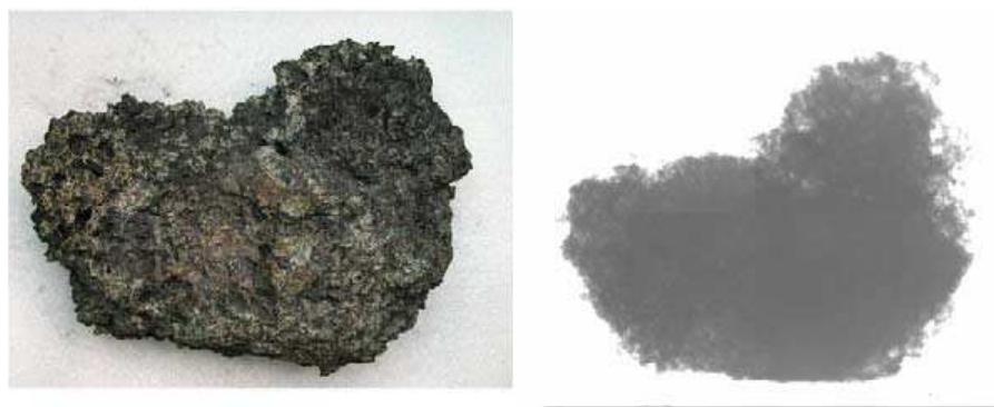 Fig. 9. Zurich Coin Agglomeration: The object with about 40cm diameter and a weight of about 80 kg is considered as a found piece from Celtic era, made from molten coins. The transmission with neutrons was possible and this insight delivered the information that no remaining integer coin is inside the object, which were assumed by archaeologists. 