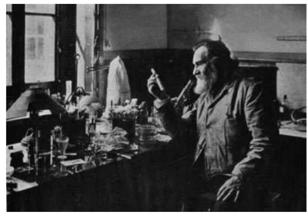 Figure 3. Elie Metchnikoff in his laboratory. Photograph by Branger, 5 rue Cambon, Paris [3].  Figure 2. Elie Metchnikoff: a photographic portrait by Nadar [2]. 