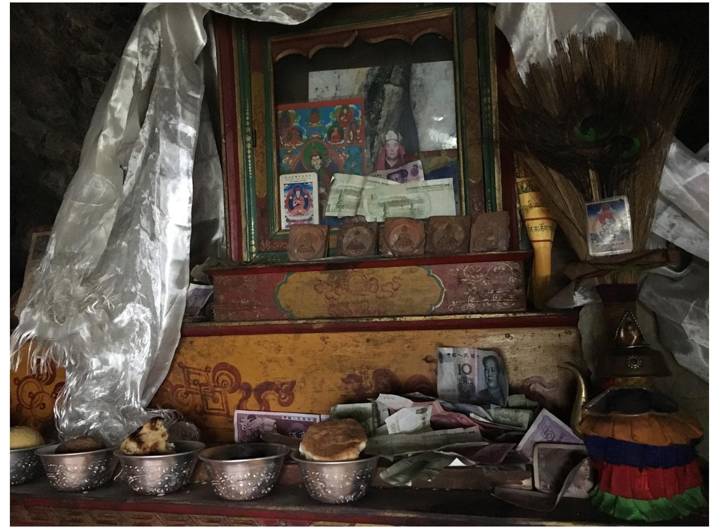 Figure 7: Altar located in Nangsa Ohbum’s meditation cave on the mountainside above Sertrag Drupde Monastery, Tibet, July 10, 2018. Photograph by author. 
