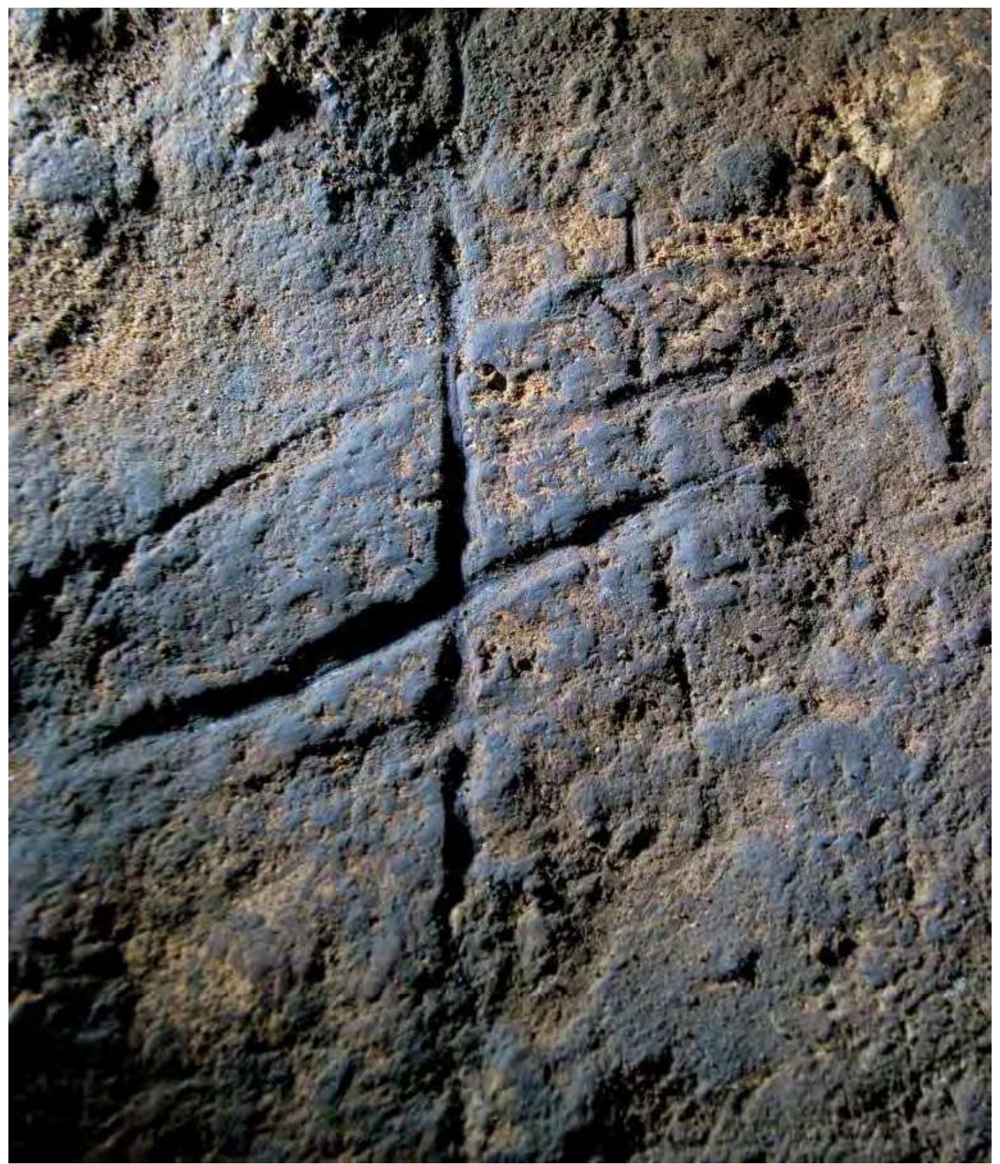 the use of the cross and related symbols extend back to the dawn of art and tradition itself.  principles. Relating this back to Guénon's Symbolism of the Cross brings an integrated view of the metaphysical implications of the symbol. Guénon's words quoted in the introduction are worth recalling: he states that the cross 'is common to almost all traditions, a fact which would seem to indicate its direct attachment to the great Primordial Tradition'.2? Without delving further into Guénon's extensive exploration on what constitutes the Primordial Tradition, it could be said that the use of the cross and related symbols extend back to the dawn of art and tradition itself.  The cross, the gammadia and the point form the basic 'seed pattern’ for the generation of the ‘Cretan Maze’, also known as the ‘classic maze’. At the heart of the generation of the maze is the cross, surrounded by four gammadia and four points. The basic seed pattern comprises a square with a centralized cross (Diagram 10.3). Successive lines are scribed from alternating centres. The origins of this complex maze pattern are unknown but it can be found across 
