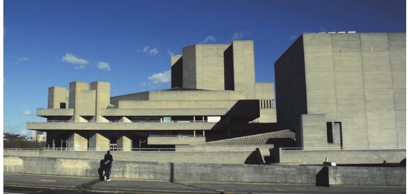 The Royal National Theater, South Bank, London, Denys Ladsun, 1976  In this climate of fear, ambiguity, risk, and security, Brutalist structures are like sanctuaries, signifying strength, security, and permanence. Bruta- list durability, material presence, and monumentality serve as a bulwark against the evanescence of everyday life and the disembedding of temporal and spatial experience. The buildings are not appealing, high-profile tar- gets like the twin towers of the World Trade Center and the central business districts of nearly all globally significant cities. In contrast to the slick, ephemeral, glass towers with fragile, opaque, cladding and ultralight ske- letal walls, the rough concrete surface, horizontal orientation, and sheer bulk of Brutalist buildings connect them to the ground in a tangible man- ner. In doing so they may symbolize a ground of existence in a world that has become precarious and terrifying.  One of the better examples of a popular Brutalist building with monu- 
