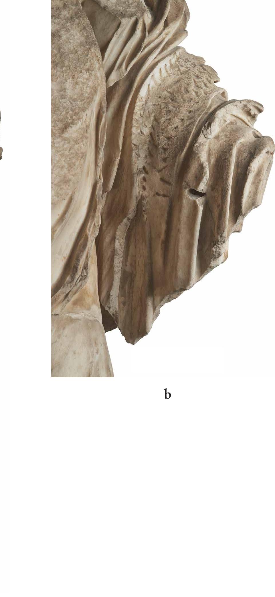 its back and the contiguous part of its flanks from scrutiny.° It was also extensively repaired in front, apparently by its original author, and bears a large, curved, somewhat concave, tapering cutting in the crook of its left elbow (Fig. 3:b). Like the similar cutting on the mid-Hellenistic Kybele from Pergamon (Fig. 4), this one surely was intended to hold a large 