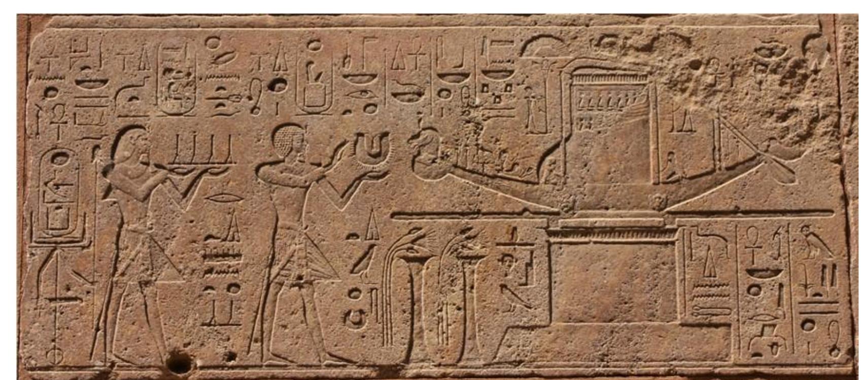 Figure 8: Queen Hatshepsut is presenting the wsh collar and the mnht cloth to the boat of god Amon, block no. 31 North wall, the Red Chapel at Karnak temple. 