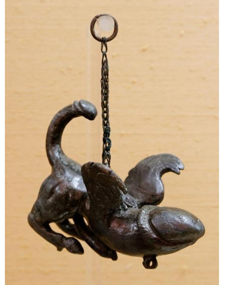 Fig-9: Bronze fascinus, from Pompeii, first century CE, bird- shaped with scorpion phallic tail and two two insects on its back, National Archaeological Museum, Naples.  