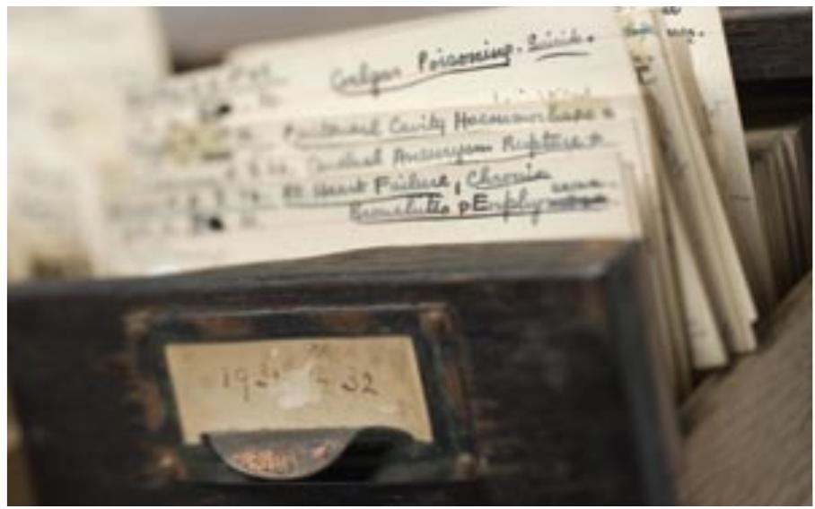 The longer-term objective of the pilot project is to secure funding in order to explore the broader development of forensic medicine and science in 20th-century Britain. Our goal is to rewrite the conventional (largely biographical) literature, which presents lone ‘celebrity’ practitioners such as Spilsbury as the publicly acclaimed face of a pathology-based forensics in the first half of the 20th century. We suspect that modern-day forensic science, which is now overwhelmingly laboratory-based and underpinned by cutting-edge developments in molecular biology, has tended to reinforce this image of isolated and insular post-mortem heroics as a throwback toa more ‘primitive’ age, in which the mortuary provided the stage for the core encounter between raw corpse and its medical interlocutor. This image is set in stark contrast to modern-day crime scene investigation, where evidentiary traces are first collected by lay ‘Scene of Crime Officers’ whose identities are concealed by white suits and masks to prevent the contamination of evidence, and then stored, classified and analysed by laboratory technicians, whose identities are submerged within a highly bureaucratised forensic science landscape.