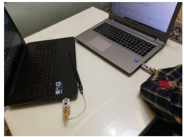 Fig.18: Base station (laptop) and the prototyped PIFA for the wireless link evaluation . 