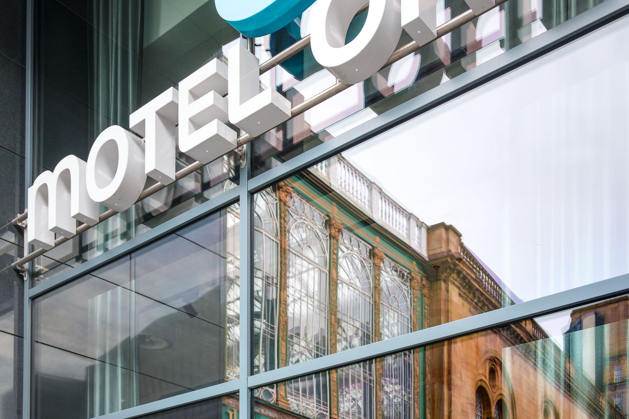 hotel Glasgow Motel One glass facade with logo