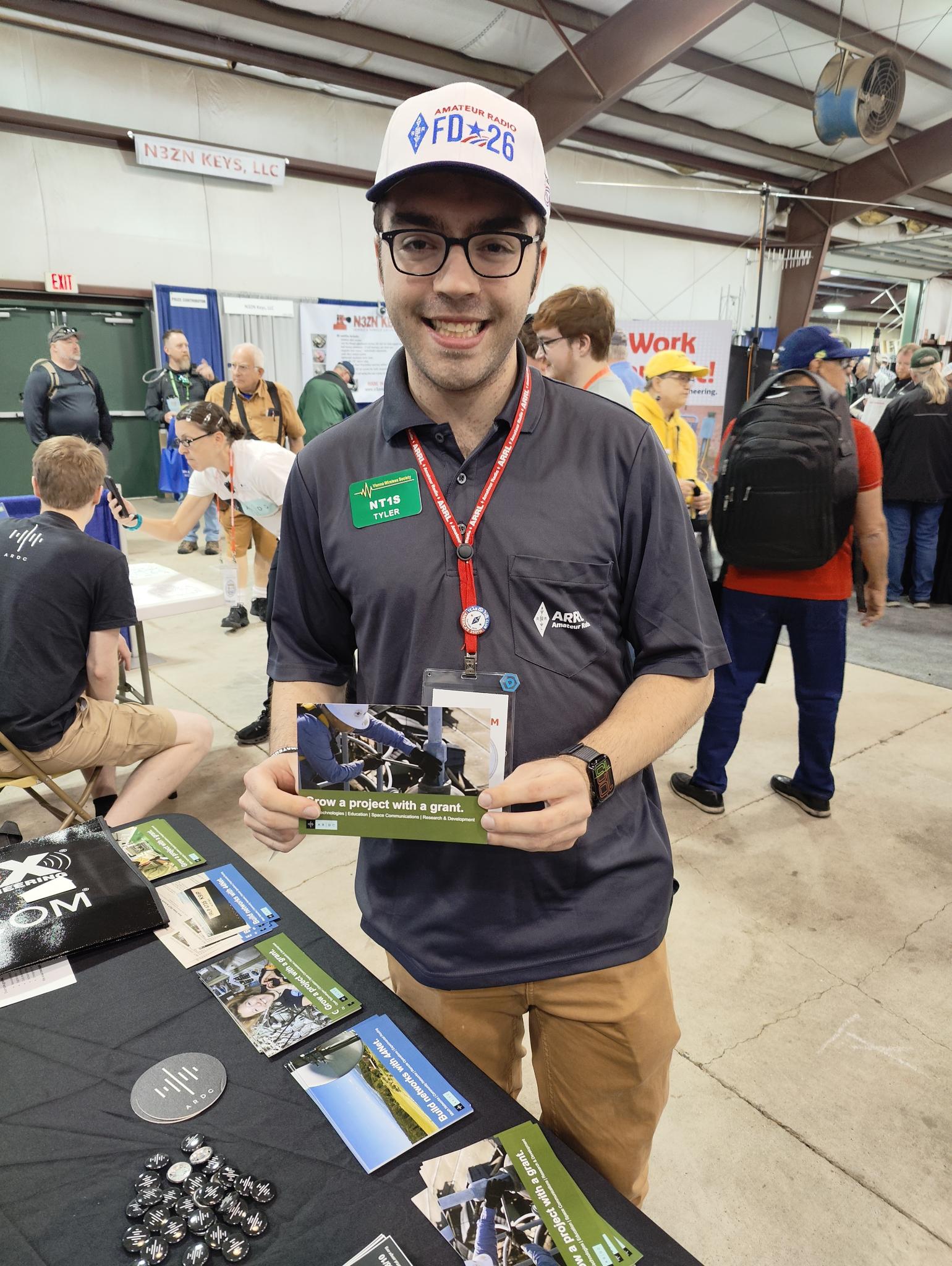 ARDC Scholarship recipient Tyler Schroder NT1S stops by the ARDC Booth, Dayton Hamvention 2026