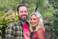 Gina Kirschenheiter and Travis Mullen posing together outdoors.