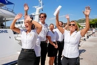 Aesha Scott, Cooper Dawson, Kayley Smith, Joe Bradley, and Captain Sandy Yawn cheering on Below Deck Mediterranean Season 11.