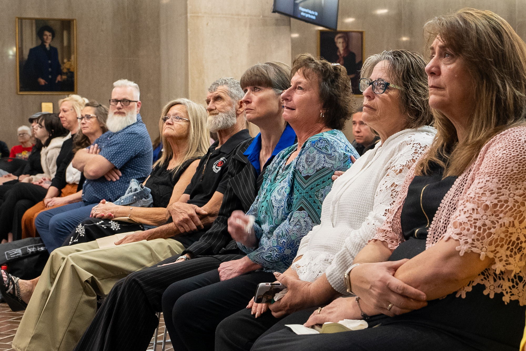 Families listening to ceremony